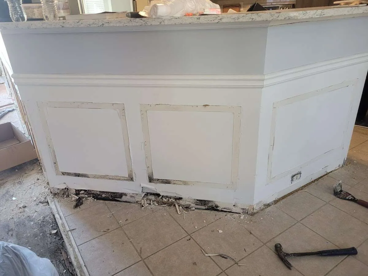 Water damage and mold on kitchen during Storm Damage Restoration in Ramapo